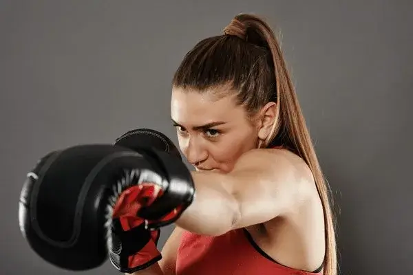 woman throwing a straight punch