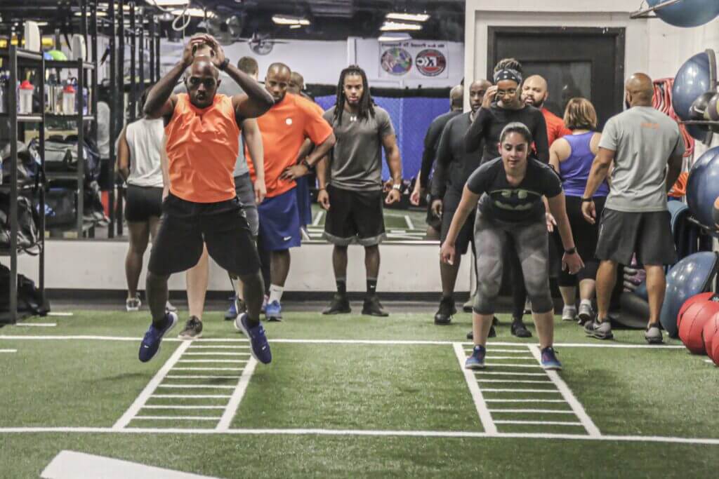 An interval training group class at X3 Sports Marietta