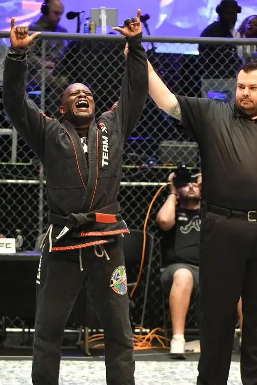 Photo of Marcus winning a competition.