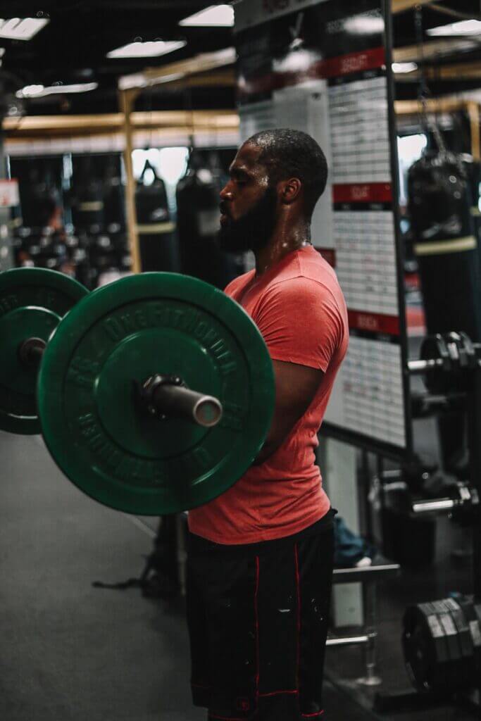 Athlete lifting weights at X3 Sports gym