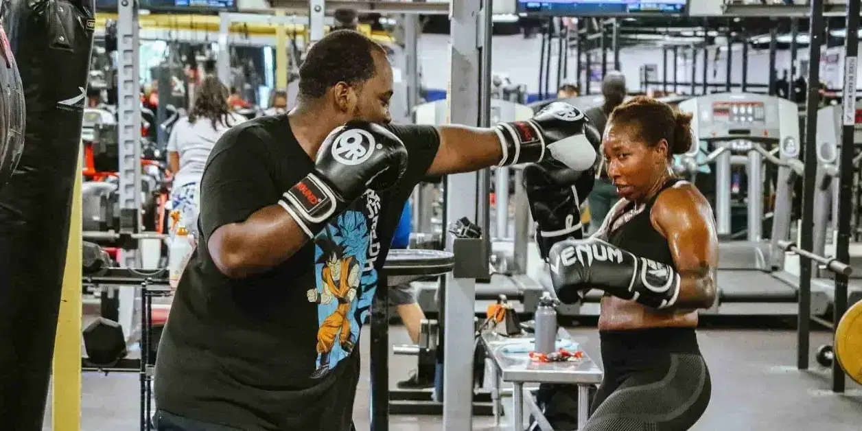 Woman practicing boxing exercise workout for jab technique